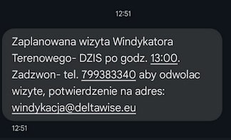 SMS od firmy windykacyjnej DeltaWise informujący dłużnika o rzekomej wizycie windykatora terenowego – przykład taktyki wywierania presji psychologicznej